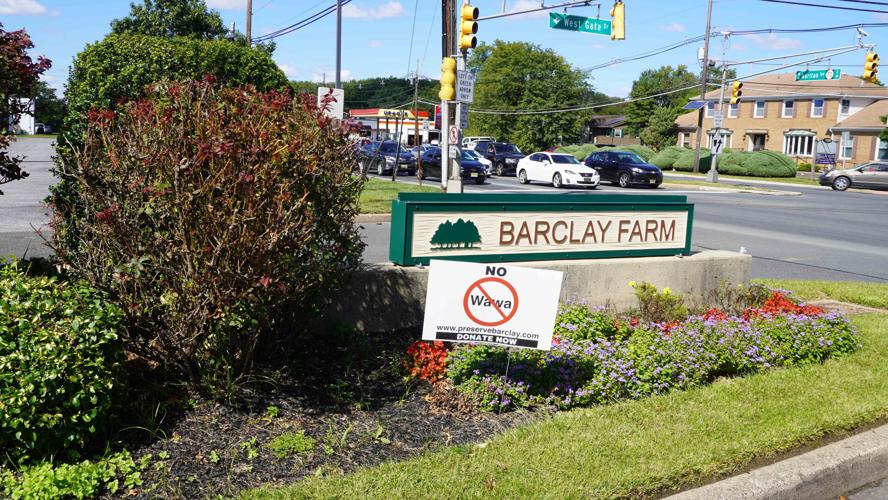 XXX09292021 BARCLAY FARM MEDIAN WITH WAWA PROTEST SIGN.JPG