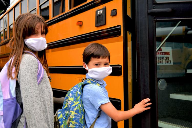 Students getting on bus