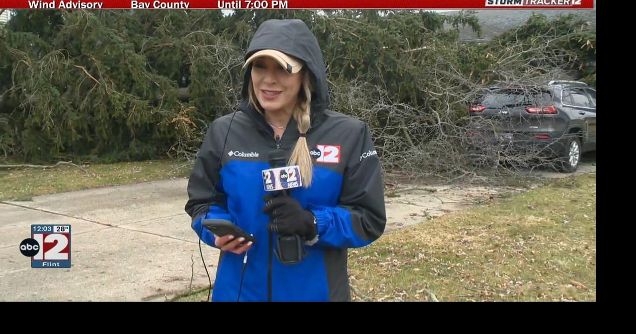 Residents in Grand Blanc's Indian Hill neighborhood clean up from