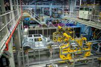 BMW will invest $750 million to keep making the Mini in Oxford | Business |  abc12.com