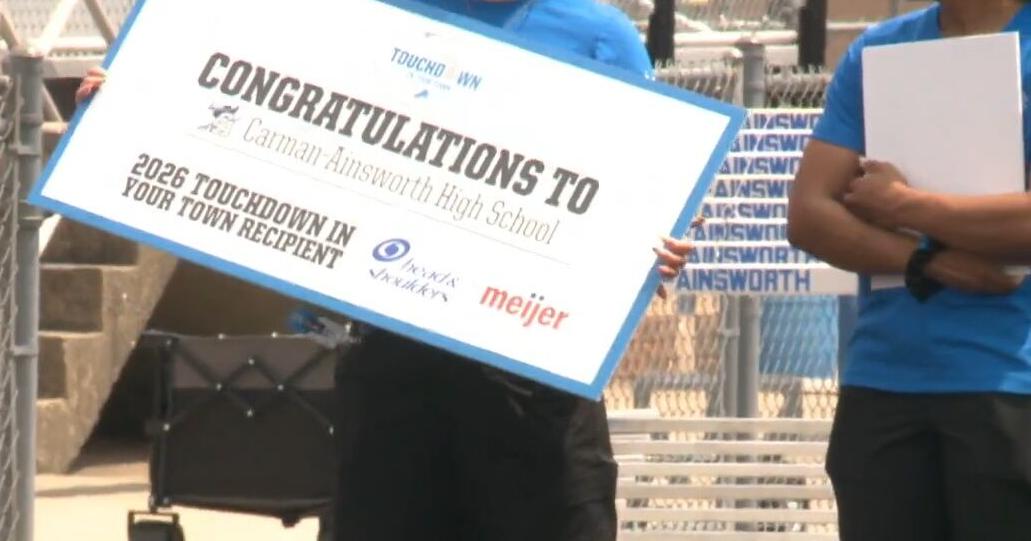 Detroit Lions surprise Carman-Ainsworth HS cheer team with 'Touchdown in Your Town' grant