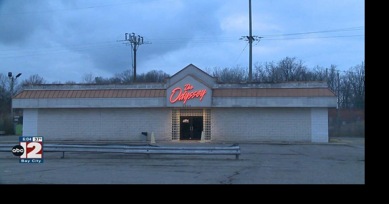 Police investigating a homicide at the Odyssey Sports Bar in Flint