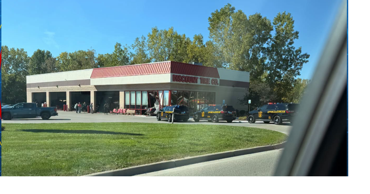 Man arrested after driving into the lobby of Discount Tire
