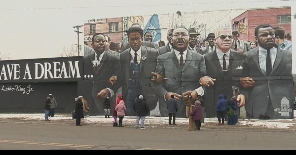 Community members vow to continue the work of Dr. Martin Luther King Jr ...