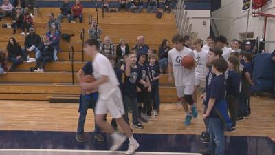 North Branch running out during warm-ups against Imlay City