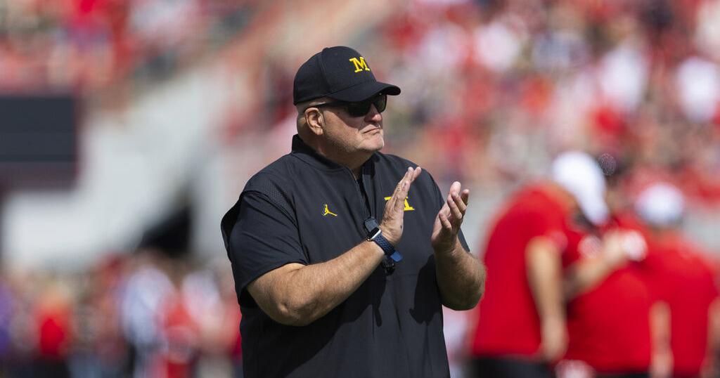 Michigan interim coach Biff Poggi wants to keep the job beyond bowl game
