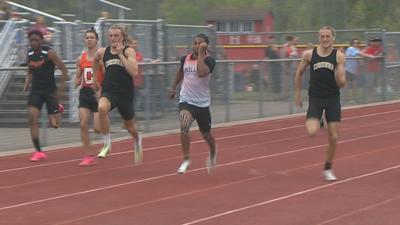 Corunna's Wyatt (left) and Tarick (right) Bower race in the 100 meter dash at the FML Championship