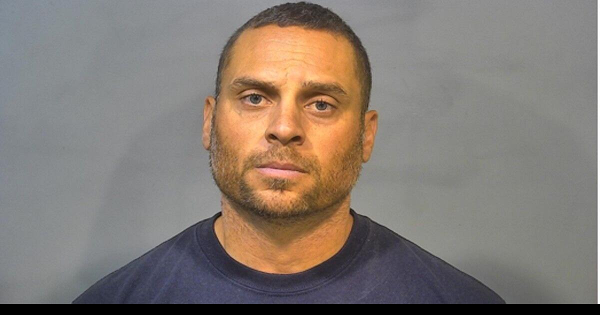 Vassar High School assistant football coach on leave after charges