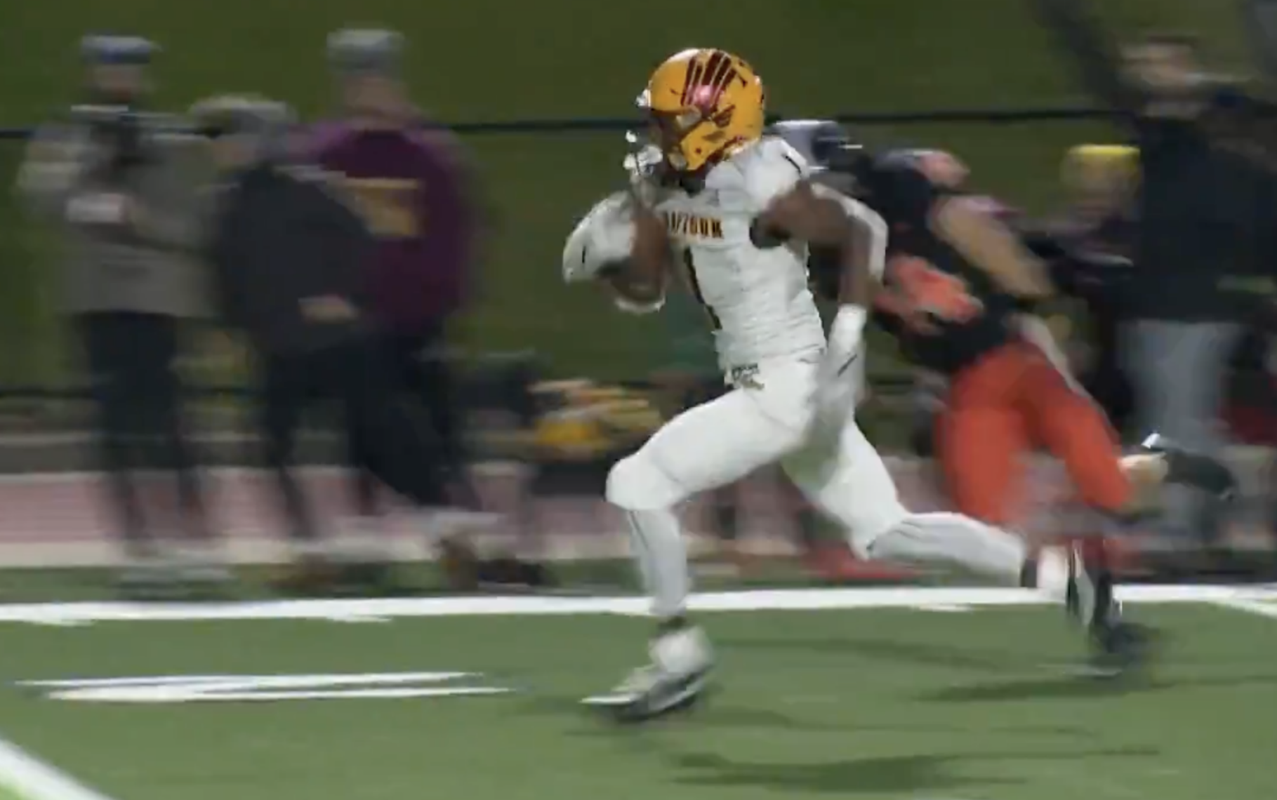 Davison's AJ Hill runs for a touchdown against Rockford in the D1 regional finals