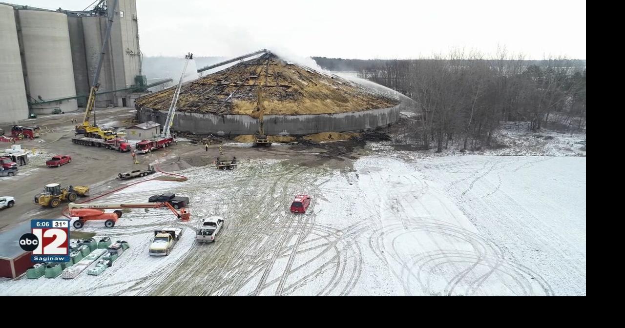 Dozens of firefighters battling corn silo fire for second day | Local ...