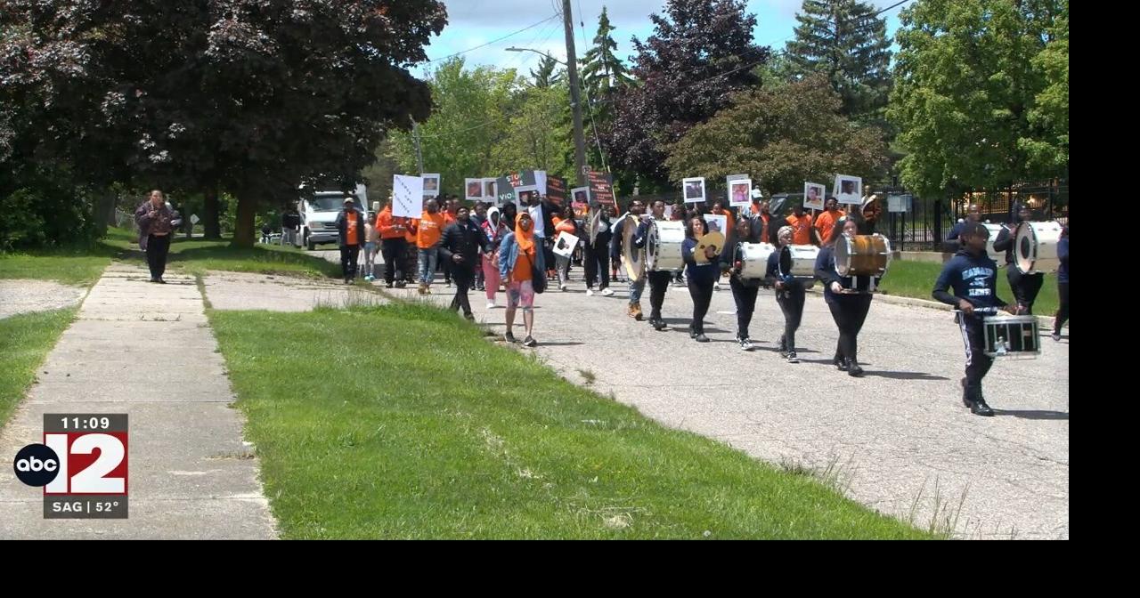 Flint residents gather for 'Silence the Violence' walk | Local | abc12.com