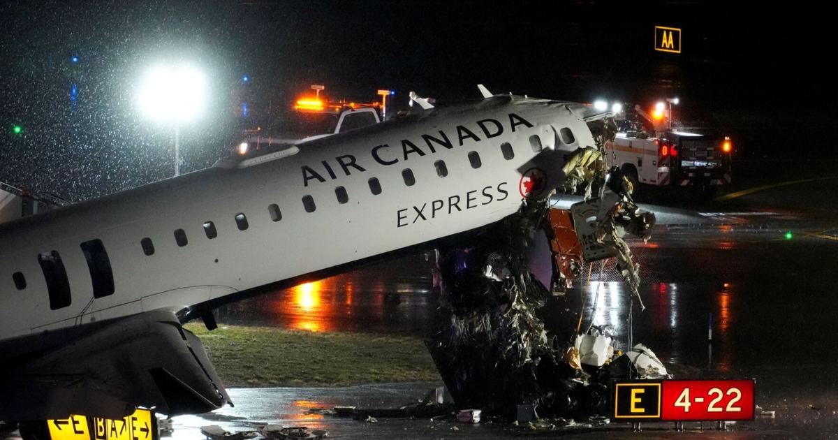 2 killed, dozens injured after Air Canada flight hits fire truck