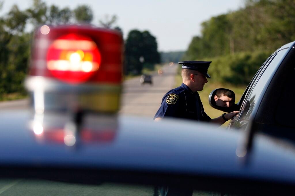 Police Officer Pulling Someone Over