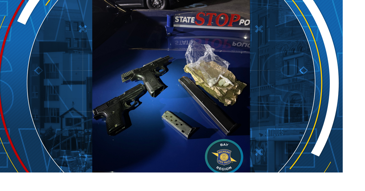 Two arrested after drugs and handguns were found during a traffic stop ...