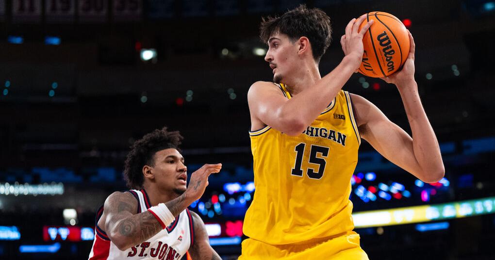 Michigan team on a roll tries to derail a UConn dynasty for NCAA title