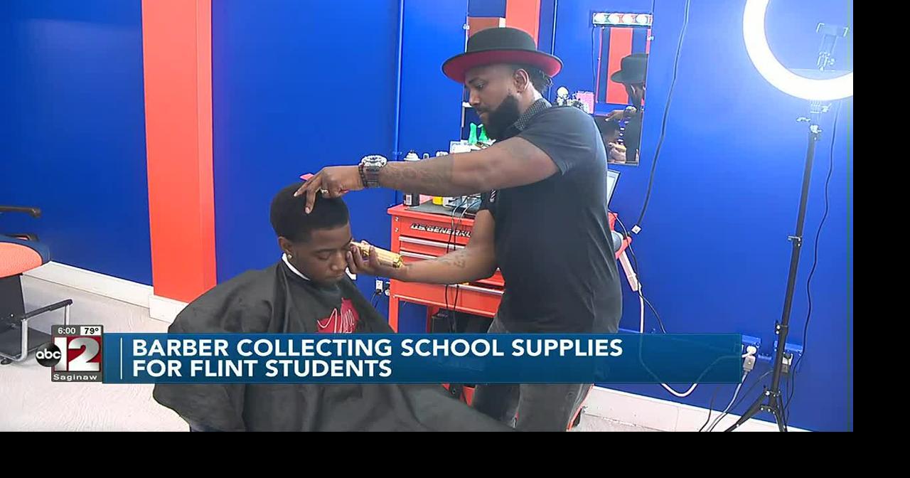 Flint barber hosts 10th annual Back to School free haircut, school
