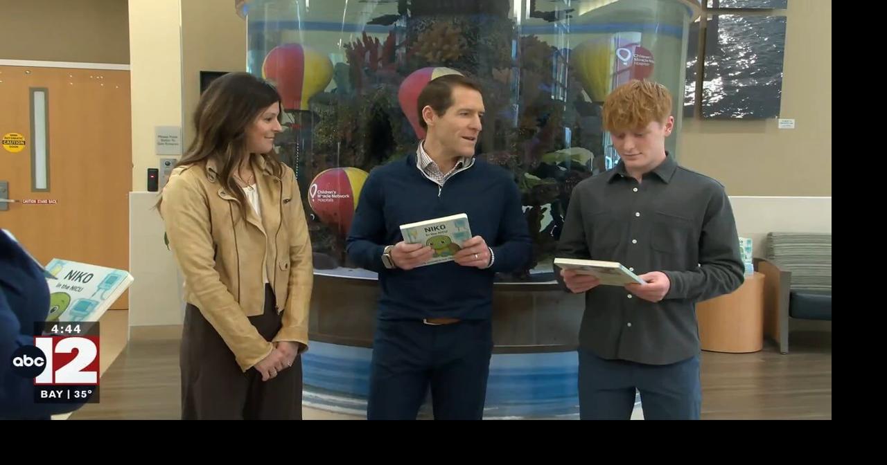 Randy Wise Automotive donates books to Hurley Medical NICU