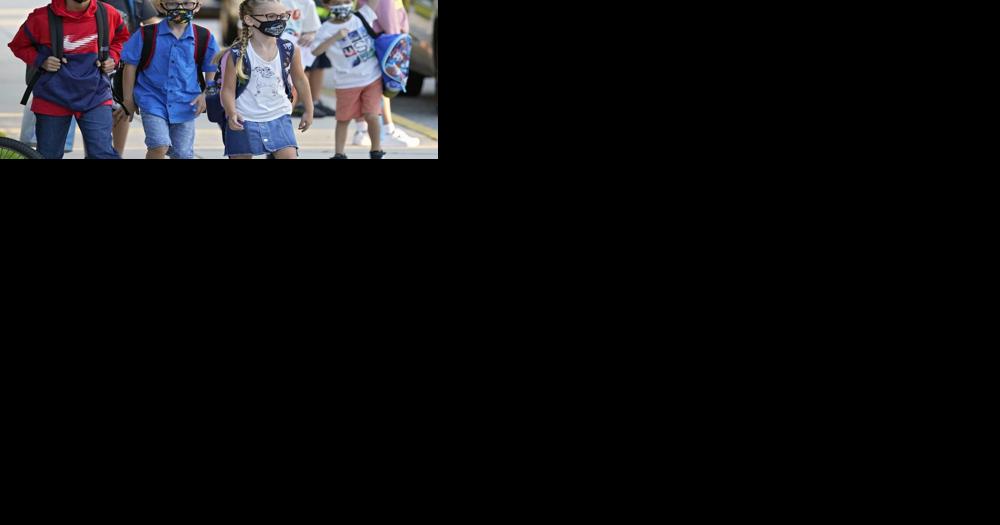Michigan schools urged to push masks, vaccine, testing as COVID-19 cases surge - Vimarsana News
