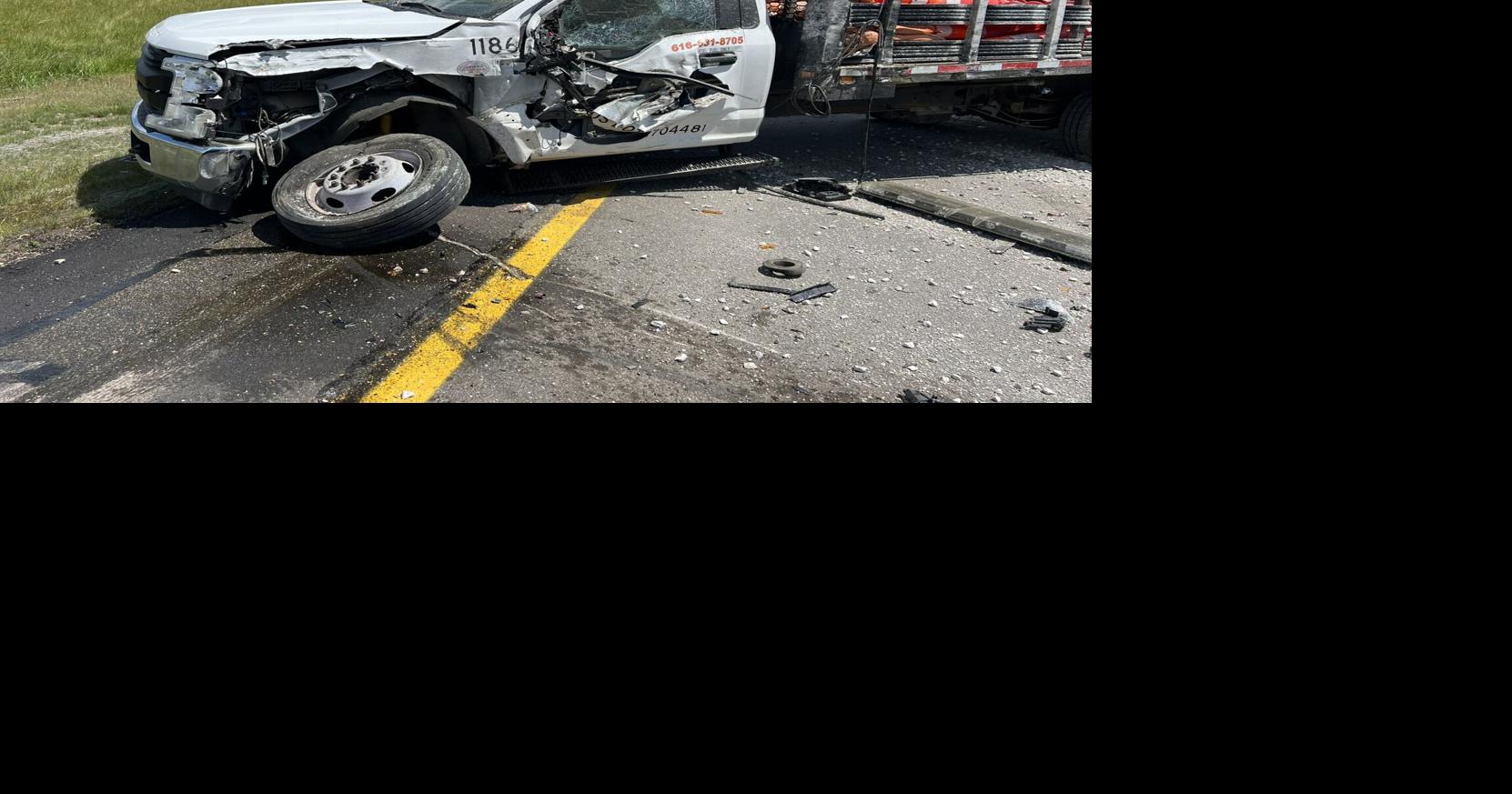 Minor injuries reported after a semi hits a work vehicle near Lansing ...