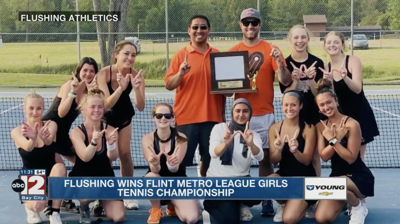 Flushing girls tennis team poses after winning Flint Metro League