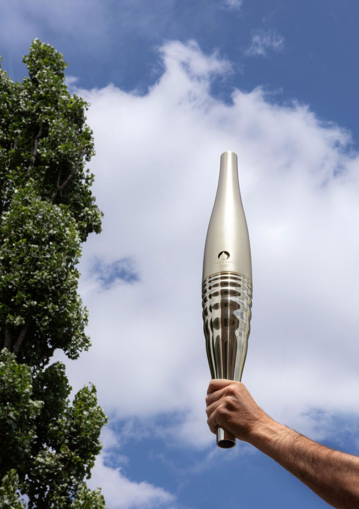 Paris 2024 Olympic And Paralympic Torch Unveiled | | Abc12.com