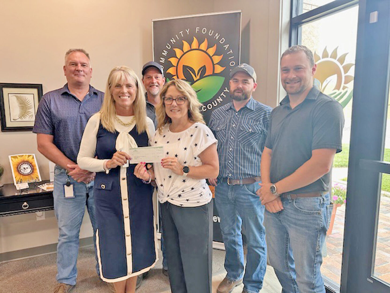 Great Plains Manufacturing employees donate to support CORE program