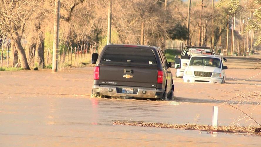 Driver gets stuck in flood waters on live TV | Local | actionnewsnow.com