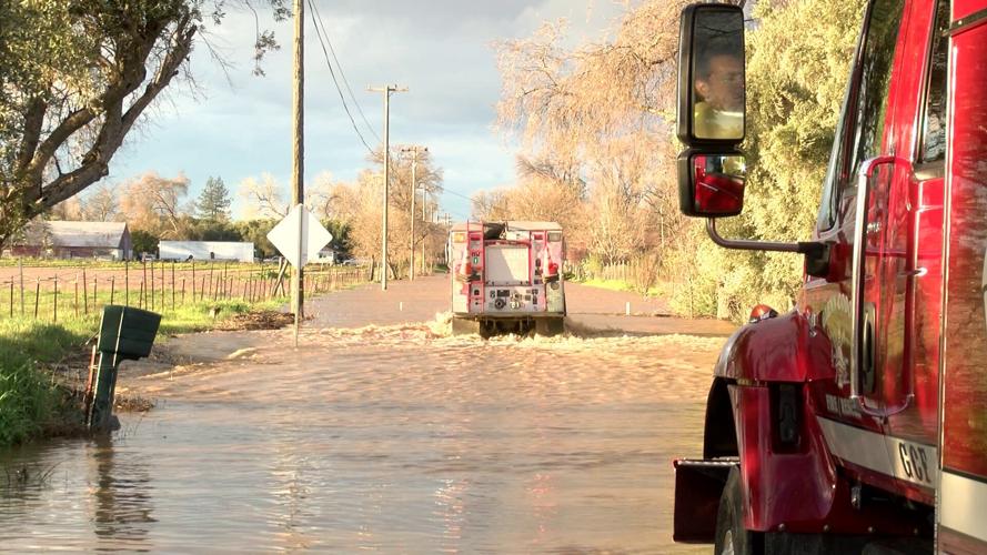 Driver gets stuck in flood waters on live TV | Local | actionnewsnow.com