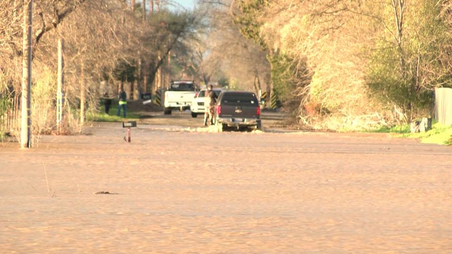 Driver gets stuck in flood waters on live TV | Local | actionnewsnow.com