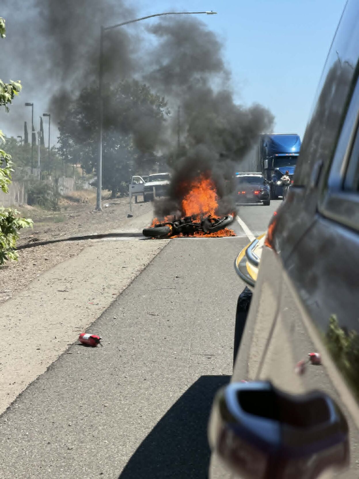 Motorcyclist suffers minor injuries after motorcycle catches fire
