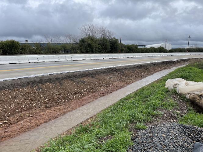 Winter storm causing heavy erosion on a newly rebuilt section of ...