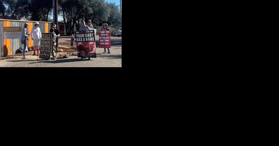 Anti-abortion activists protest outside women’s healthcare clinic in Redding