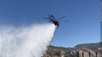 Helicopter fighting Lava Fire performs emergency landing into lake
