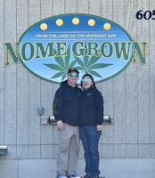 Nome Grown signage and owners