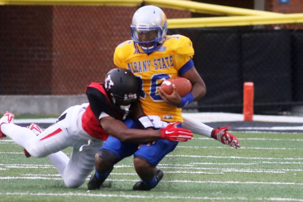 Albany State quarterback Caleb Edmonds looking downfield, not looking ...