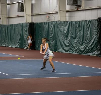 Women's Tennis sees a community of support and cinches their ninth consecutive win