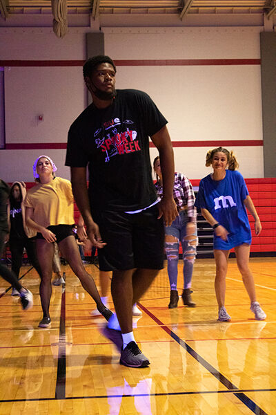 Rhodes draws fellow students to dance floor