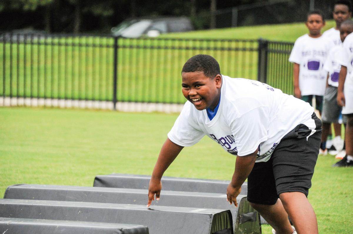 Photos Auburn Players Visit Bridge Builders Youth Football Camp