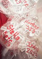 Students gift compliments in ornaments