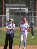 Horseshoe Bend Lady Generals softball limbers up during throwing period