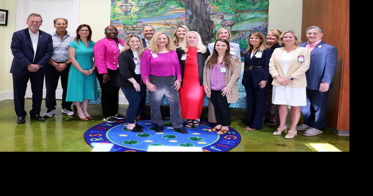 STHS cuts ribbon on Parenting Center's new forever home on Koop Drive