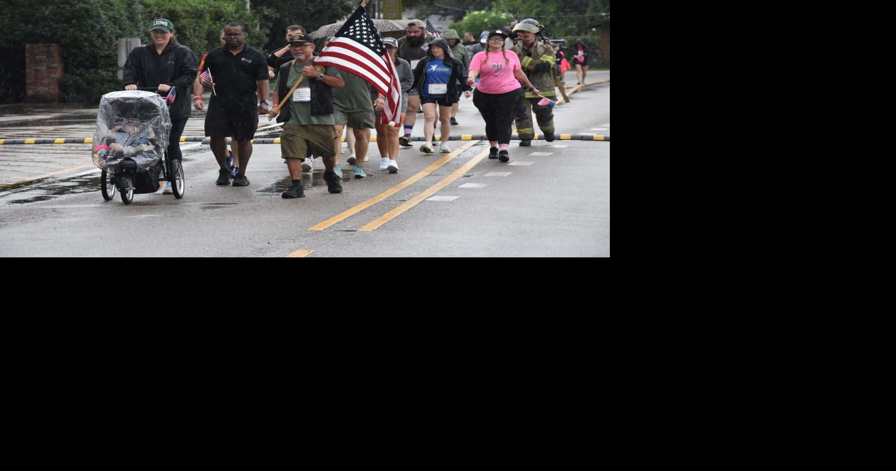 Veterans, families brave rainy weather to participate in Carry the Load walk at SLU