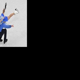 Canadian ice dancers put 'dark times' behind with Olympic medal