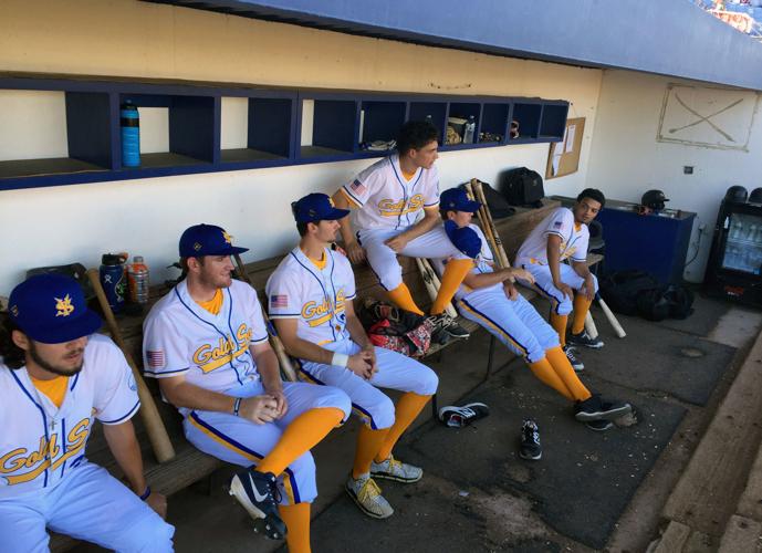 Usa California San Bernardino Baseball Players Sitting In Dugout