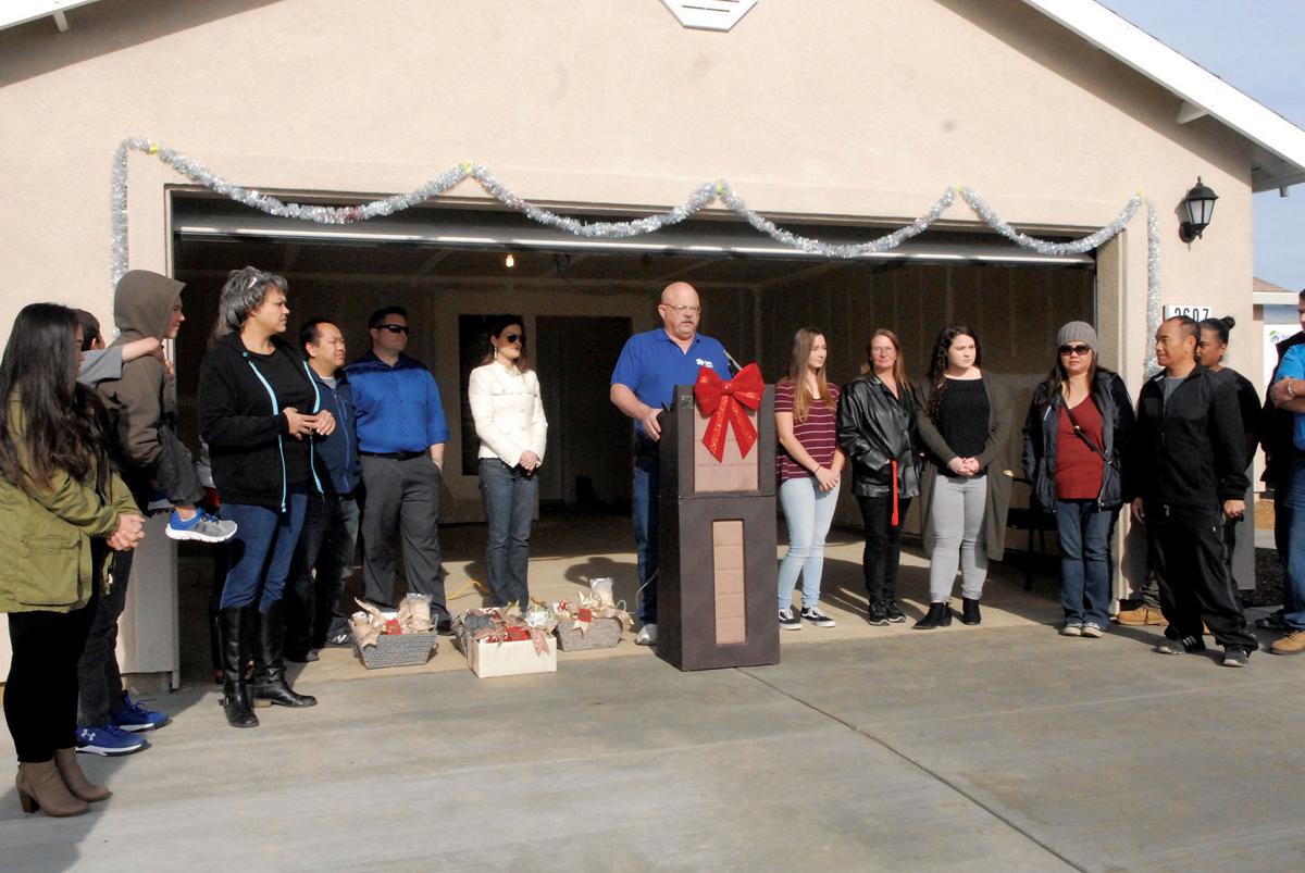 Families receive their ‘forever homes’ in Habitat for Humanity key