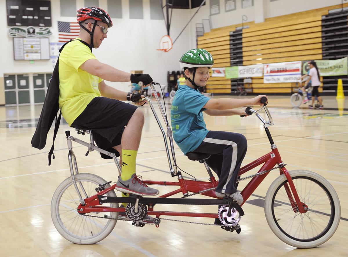 Spinning their Wheels iCan Bike gives developmentally disabled a