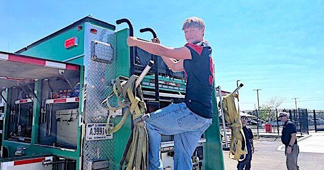 Corning High School students learning the ropes of firefighting