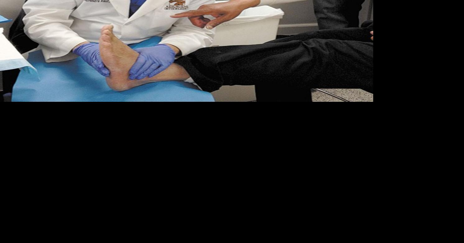 Resurgens Orthopaedics surgeons help homeless men | | appenmedia.com