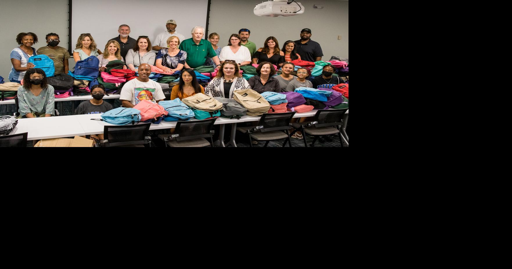 Rotary donates school supplies to Johns Creek middle schools