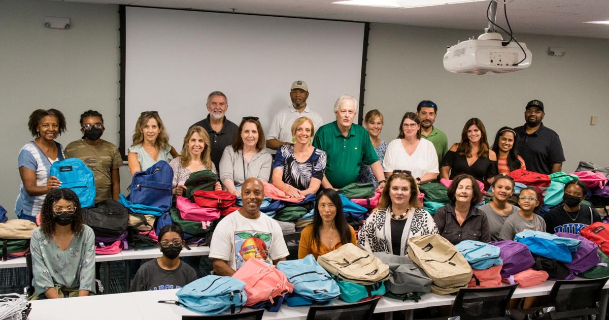 Rotary donates school supplies to Johns Creek middle schools